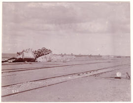 Circa 1900. Anglo-Boer War. Wolve Hoek station showing blown up tank and trucks.