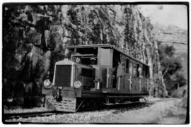 May 1929. SAR narrow gauge railcar RM NG1 in Wilson's cutting on the Port Shepstone - Harding lin...