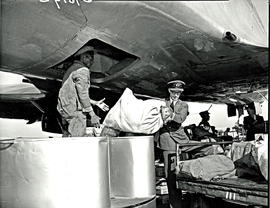 
SAA Lockheed Constellation loading mail.
