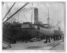Durban, circa 1901. Large ship at quayside. (Durban Harbour album of CBP Lewis)