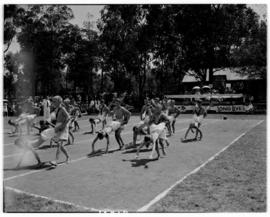 Vryheid, 24 March 1947. Wheelbarrow races in sports field.