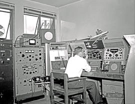 Johannesburg, 1962. Jan Smuts airport radio room ZUR. Note the Belmont BC-348-R radio, to the lef...