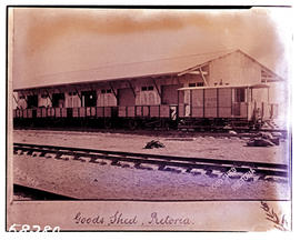 Pretoria. PPR open wagons and guard's van in goods shed. Later SAR open wagon type E-13 and W-9 s...
