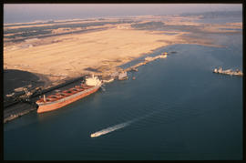 Richards Bay, July 1982. Aerial view of Richards Bay Harbour coal terminal. [T Robberts]