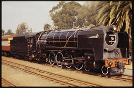 July 1991. SAR Class 15E No 2878 'Millie' with passenger train.