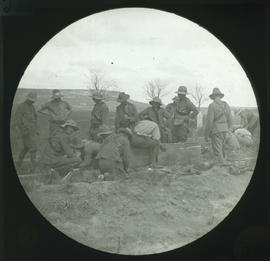 Group of soldiers at work in veld.