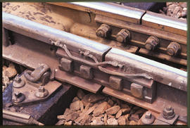 Rail to rail copper bonds to ensure electrical continuity between rails.