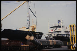 Durban, September 1984. Loading pipe bundles in Durban Harbour. [T Robberts]