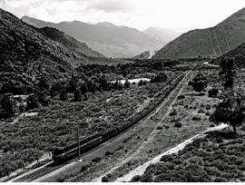 De Doorns district, 1957. SAR Class 4E hauling coal train in the Hex River valley.