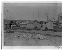 Durban, circa 1901. Shacks next to railway line near Durban Harbour. (Durban Harbour album of CBP...