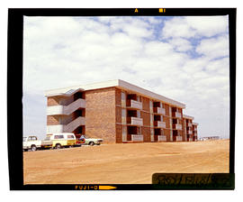 Bapsfontein, December 1982. Apartment block for black workers at Sentrarand. [T Robberts]