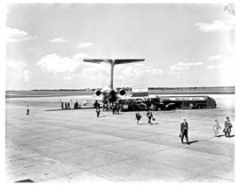 
SAA Boeing 727. Passengers disembarking. Note Mobil Jet fuel tanker
