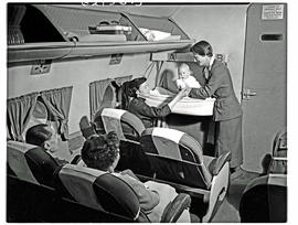 
SAA Douglas DC-4 interior. 'Sky cradle' bassinet.
