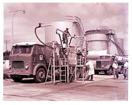 Bethlehem, 1960. Leyland truck tanker taking on fuel at fuel depot.