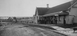 Tylden, 1895. Station buildings and staff on platform. (EH Short)