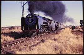 August 1991. SAR Class 15E No 2878 'Millie' with passenger train.