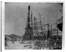 Durban, circa 1901. Harbour crane next to sailing ship at quayside. (Durban Harbour album of CBP ...