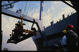 Durban, July 1986. Durban Harbour container loading. [Z Crafford]