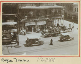 Cape Town. Trams and cars in city street.