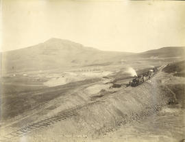 Volksrust district. Construction train on embankment at Langs Nek. (E Caney, Pietermaritzburg)