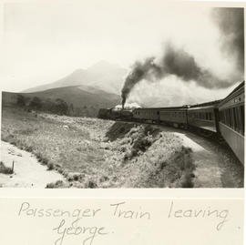 George, 1950. SAR Class GEA with passenger train leaving town.