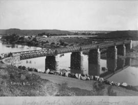 Barkly West. Barkly Bridge, six spans on stone piers, with Klipdrif (later Barkly West) in the ba...