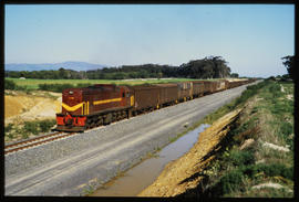 
SAR Class 35-000 No 35-458 with goods train in cutting.
