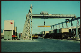 Johannesburg, 1987. Overhead crane loading containers at Kaserne.