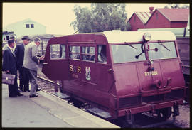 SAR Wickham trolley RT1081, men getting aboard.