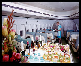 Food display and hostess in First Class section of SAA Boeing 747.
