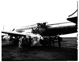 Johannesburg, May 1953. Palmietfontein Airport. Mr Brown and son alighting from SAA Douglas DC-4 ...