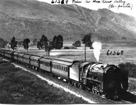 De Doorns, 1954. SAR Class 15F with passenger train in the Hex River valley.