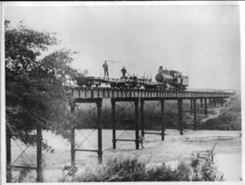 Circa 1902. Construction Durban - Mtubatuba: Construction train on completed Umvolosi Bridge. (Al...
