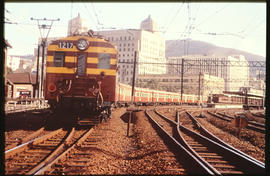 Cape Town, 1961. One of the first locally manufactured type 5M2A suburban train departing on trai...