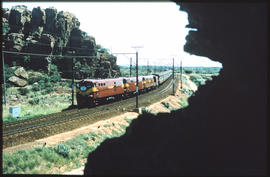 Tulbagh district, 1981. Trans-Karoo passenger train entering Tulbaghkloof at Bushman's Rock.