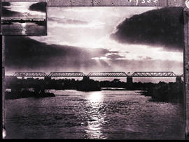 "Komatipoort, 1945. Railway bridge over Komati River at sunset."