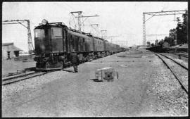 Circa 1925. SAR Class electrical locomotives with train in station. (Album on Natal electrification)