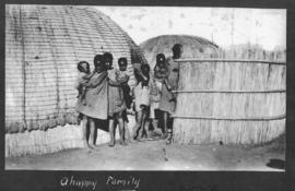 Circa 1925. Black children at traditional huts. (Album on Natal electrification)