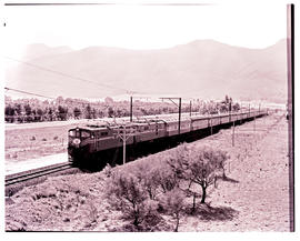Gouda district, 1974. Two SAR Class 5E1 Srs 1's with No 202up 'Trans-Karoo' passenger train.
