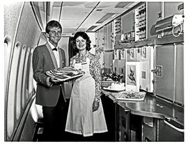 
SAA Boeing 747SP Interior. Cabin service. Steward and hostess. First class galley.
