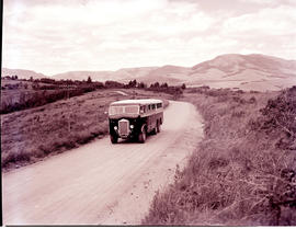 
SAR Albion three-axle bus on country road.

