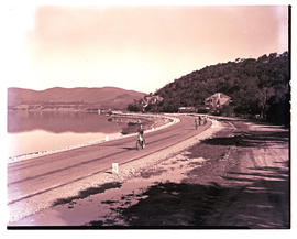 "Knysna, 1952. Road alongside lagoon."