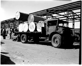 
Loading tanks onto SAR CMP truck No B5904 by forklift. CMP = Canadian Military Pattern.
