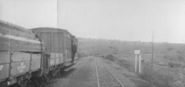 Saltaire, 1895. Goods train with guard at station. (EH Short)