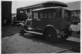 Sedan motorcar converted to railcar.