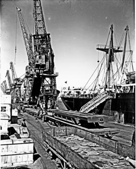 Port Elizabeth, 1948. Steel platform on goods wagon in Port Elizabeth harbour.