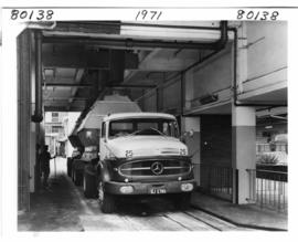Durban, 1971. Sugar being loaded onto Mercedes Benz truck in Durban Harbour.