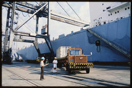 Durban, 1986. Foden truck with container next to container ship in Durban Harbour. Road registrat...
