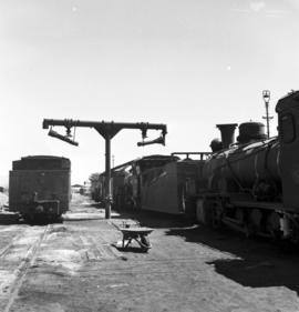 South-West Africa, January 1961. Opening of 3ft 6in line. SAR Class NG15 at watering point.