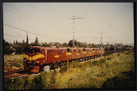 Johannesburg. Five SAR Class 6E1 Srs 11's with goods train at Roodepoort.